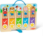 Melissa and Doug My Daily Routine Chart wooden responsibility board displaying the daytime habit side