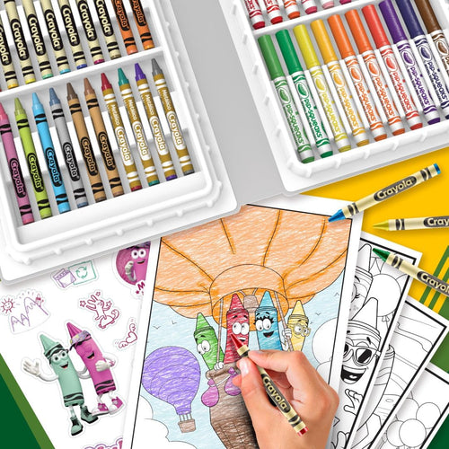 Close up of hands using Crayola limited edition colored pencils for intricate shading