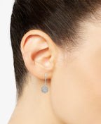 Close up of the round cut natural diamonds pave set inside the silver interlocking circles