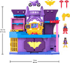 Preschool child turning the green Imaginext Power Pad to open the secret hideaway base doors automatically