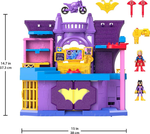 Preschool child turning the green Imaginext Power Pad to open the secret hideaway base doors automatically