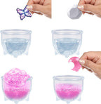 A child pouring potion liquid into the magic mirror to activate the electronic unboxing sequence