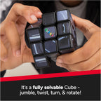The completed Black Panther Rubik's Cuber displayed on an office desk next to superhero toys and action figures