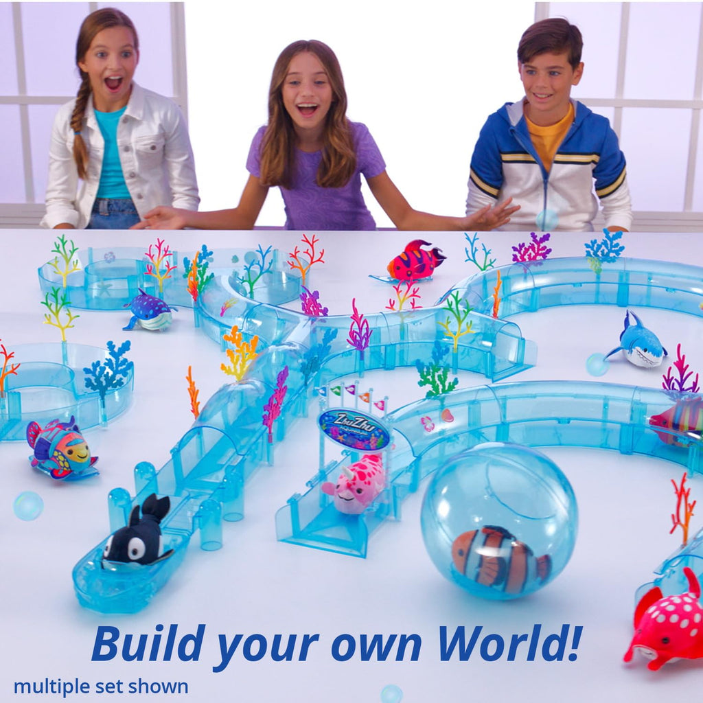 Butch the Zhu Zhu robotic shark toy swimming through transparent blue track tunnels