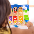 The nighttime routine side of the Melissa and Doug wooden chart showing bedtime tasks and fold out stand