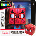 The completed Spider-Man Rubik's Cuber displayed on a bedroom shelf next to comic books and action figures